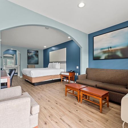 Executive Inn & Suites Магнолия Екстериор снимка