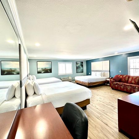 Executive Inn & Suites Магнолия Екстериор снимка