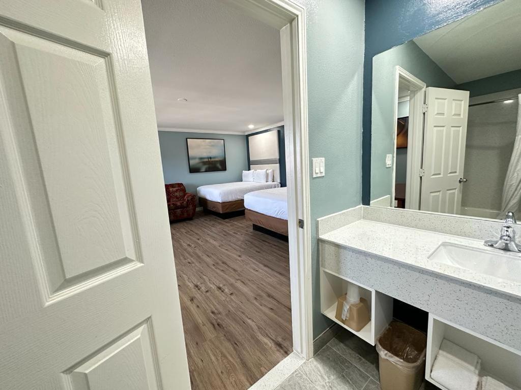 Executive Inn & Suites Магнолия Екстериор снимка