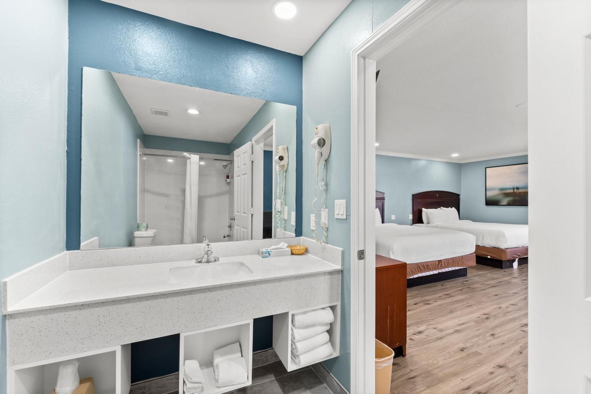 Executive Inn & Suites Магнолия Екстериор снимка