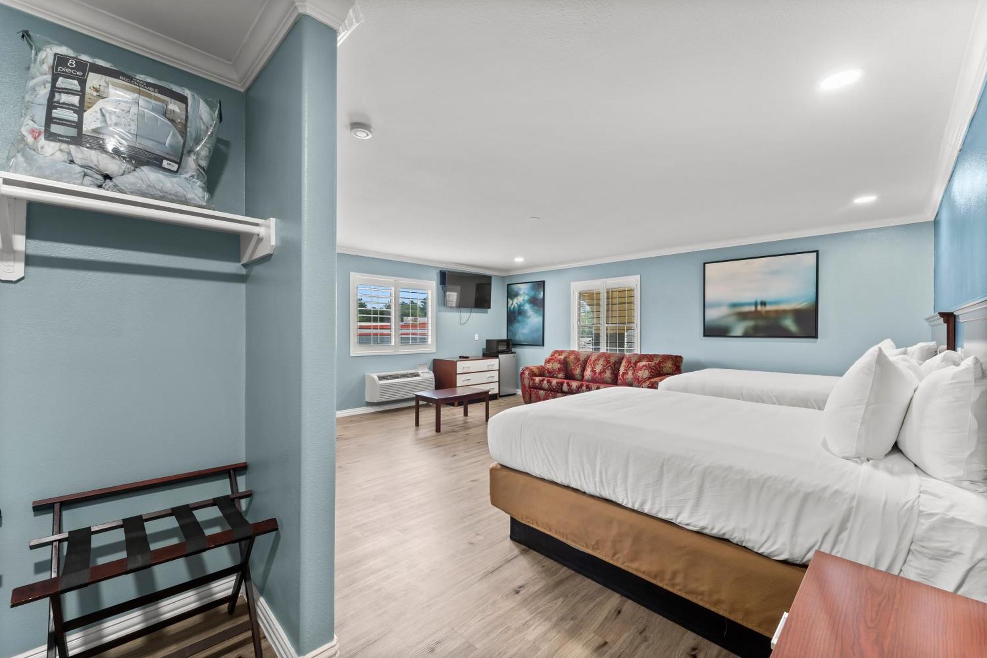 Executive Inn & Suites Магнолия Екстериор снимка