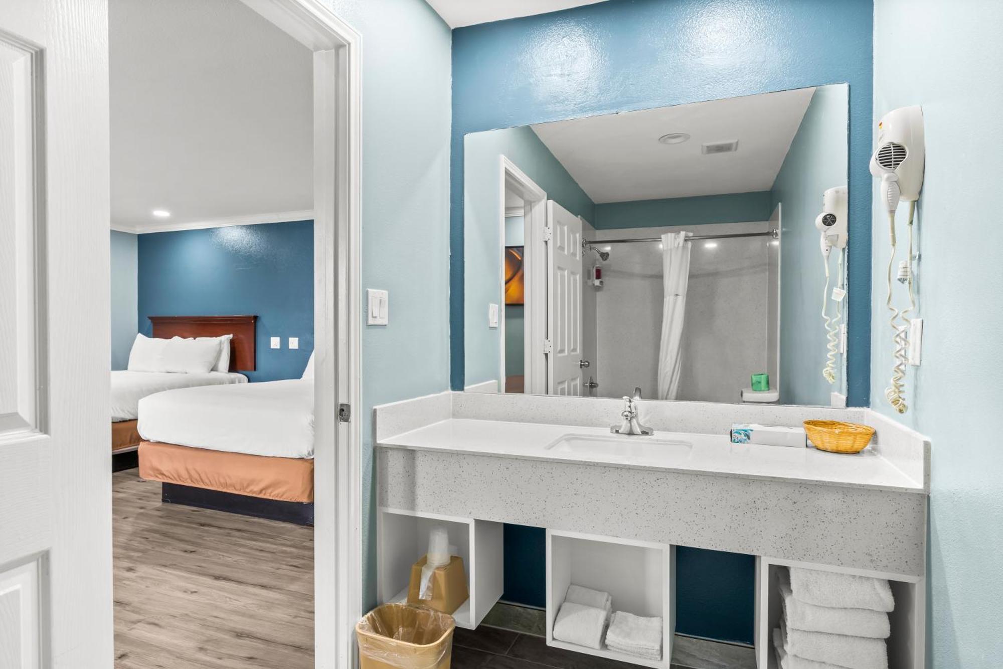 Executive Inn & Suites Магнолия Екстериор снимка