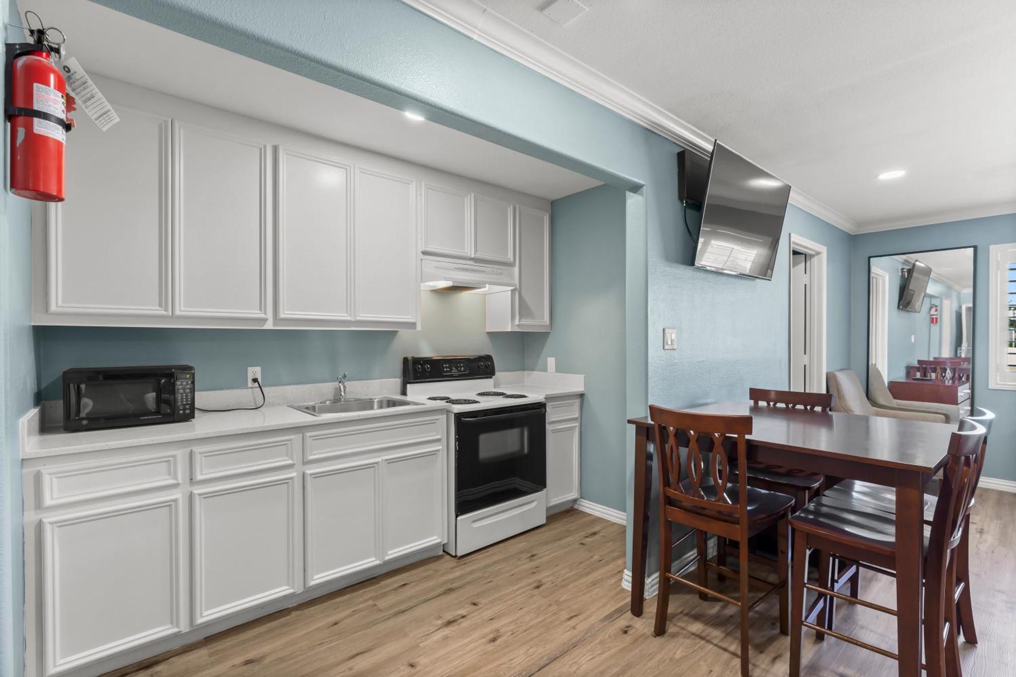 Executive Inn & Suites Магнолия Екстериор снимка