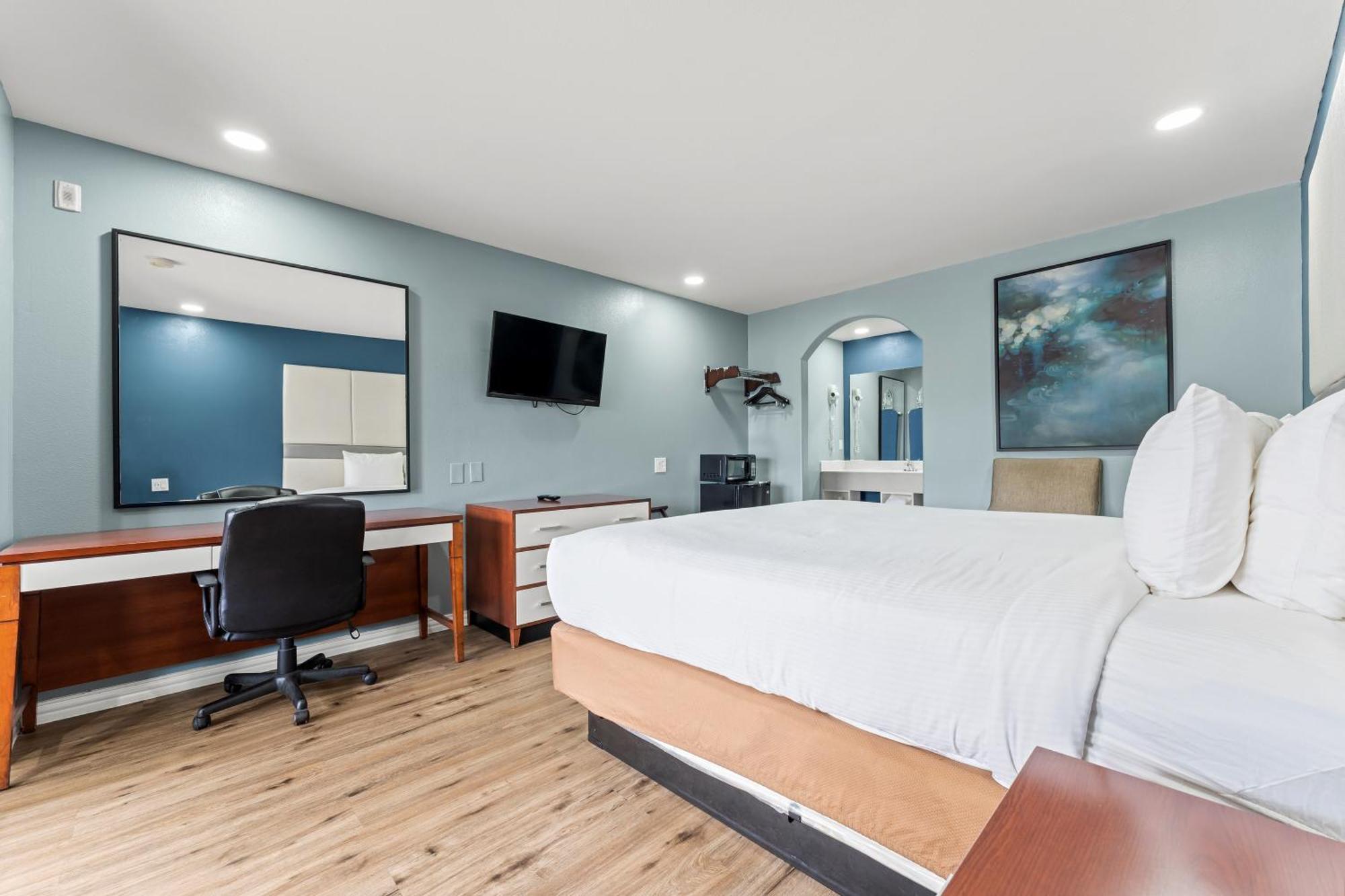 Executive Inn & Suites Магнолия Екстериор снимка