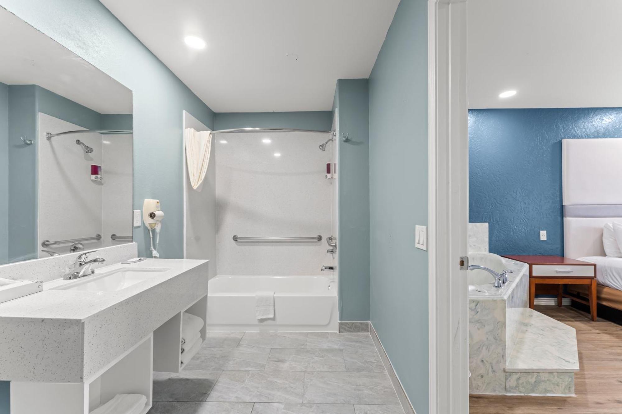 Executive Inn & Suites Магнолия Екстериор снимка