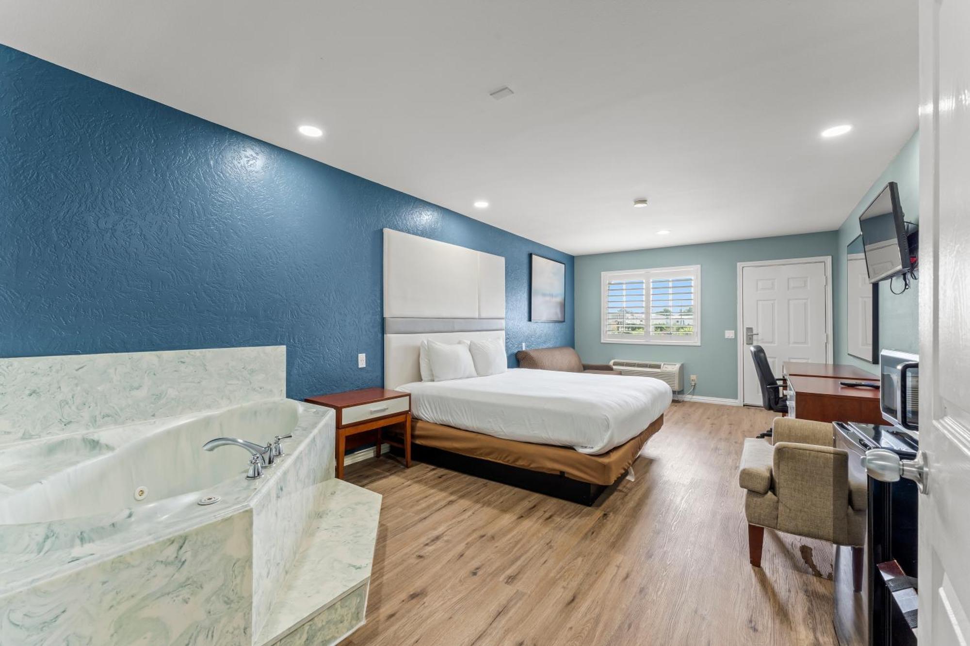 Executive Inn & Suites Магнолия Екстериор снимка