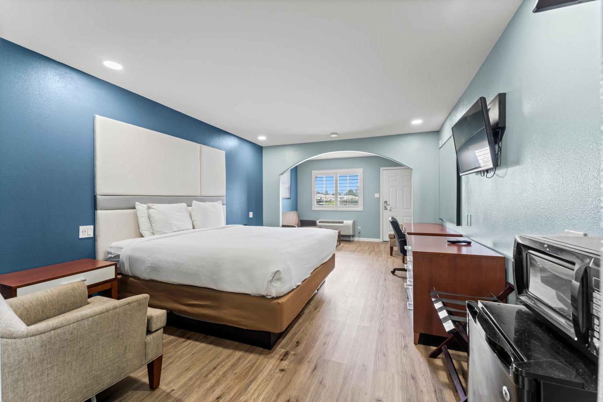 Executive Inn & Suites Магнолия Екстериор снимка