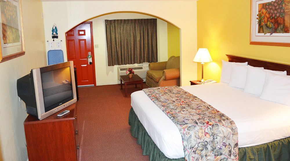 Executive Inn & Suites Магнолия Екстериор снимка