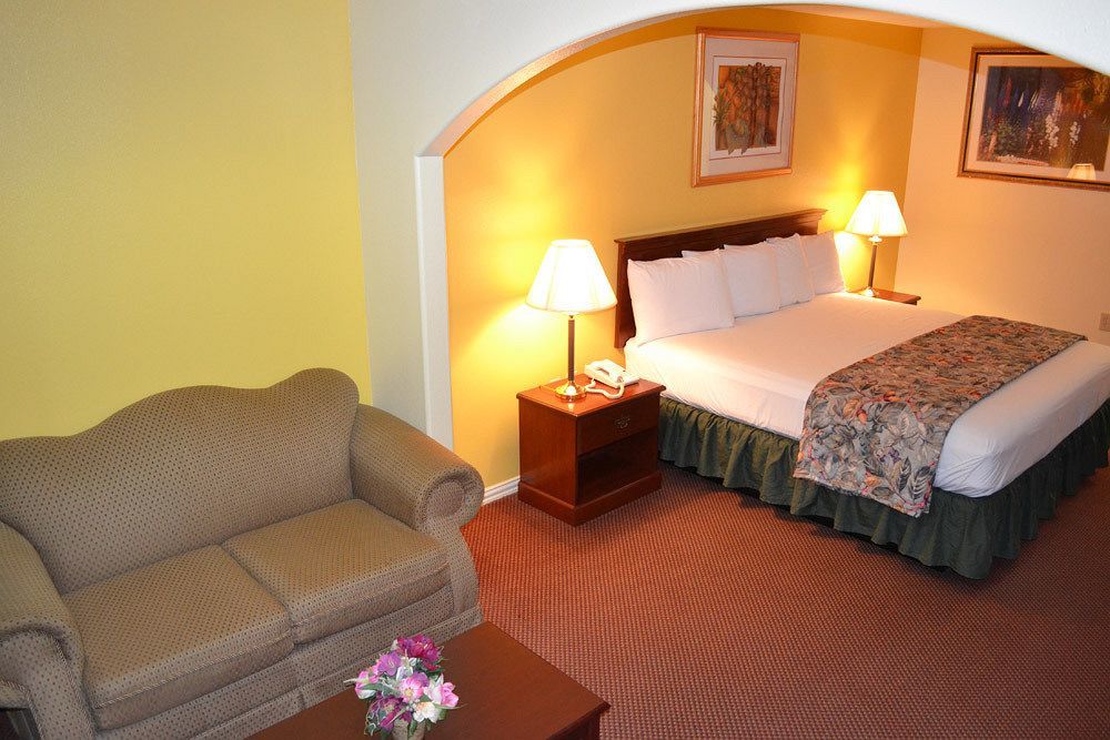 Executive Inn & Suites Магнолия Екстериор снимка