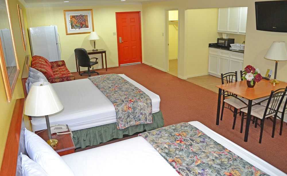 Executive Inn & Suites Магнолия Екстериор снимка