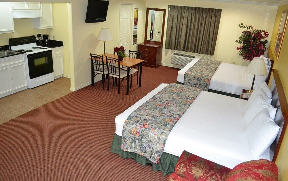 Executive Inn & Suites Магнолия Екстериор снимка