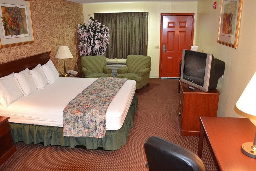 Executive Inn & Suites Магнолия Екстериор снимка